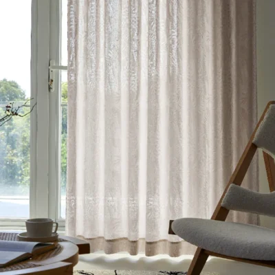 Full-length view of Botanic Veil Curtain filtering sunlight in a modern living room