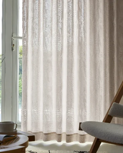 Full-length view of Botanic Veil Curtain filtering sunlight in a modern living room