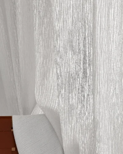 White textured chenille sheer curtain softly filtering natural light