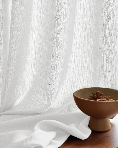 Textured chenille sheer curtain with soft drape and natural light filtering