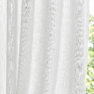 White chenille sheer curtain with soft texture and natural light filtering