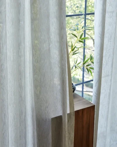 Close-up of Zen bamboo jacquard sheer curtain filtering natural light near a window