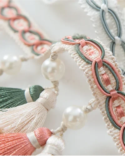 Annecy tassel fringe close-up with pearl beads and woven embroidered band