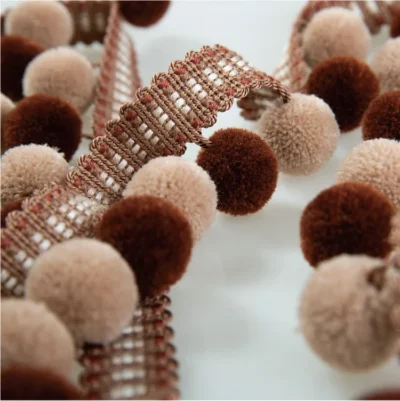 Mocha and blush velvet pom pom fringe trim with soft texture for curtains, cushions, and decor accents.