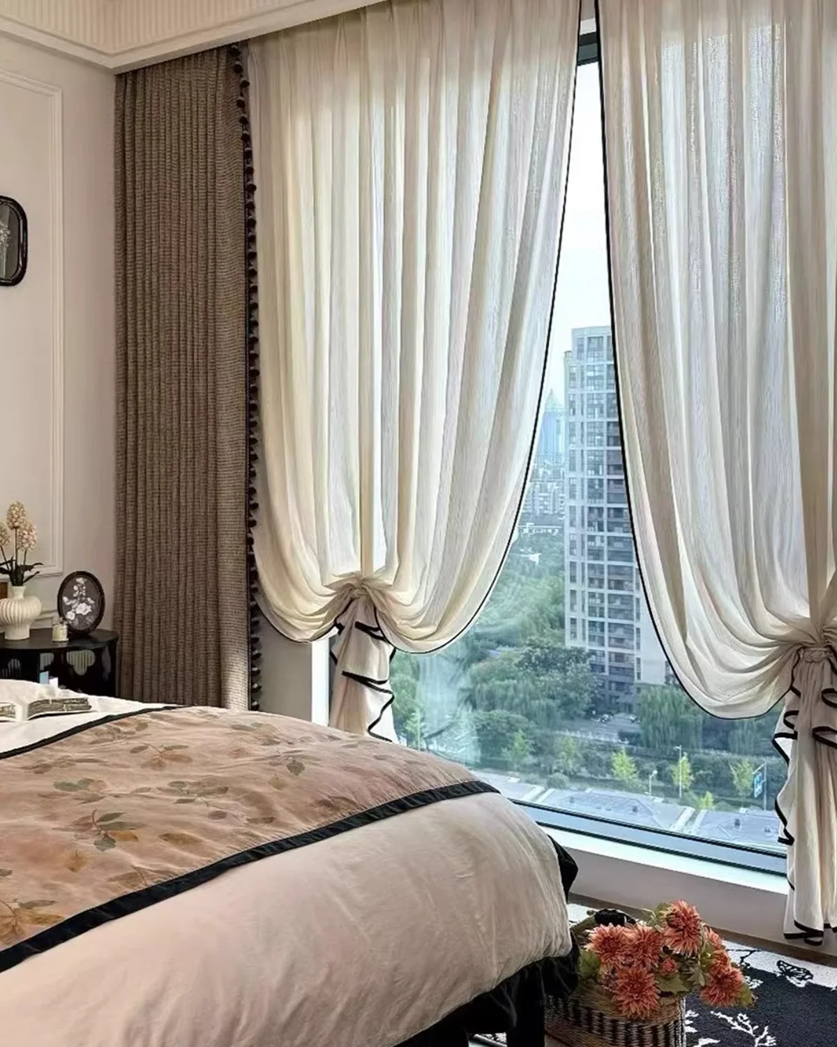 Cocoa fringe jacquard linen-cotton chenille curtain styled with white sheer curtains in a bedroom
