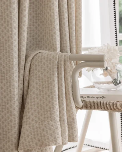 Basketweave texture curtain with soft woven drapes, close-up of textured curtain fabric in a neutral modern style.