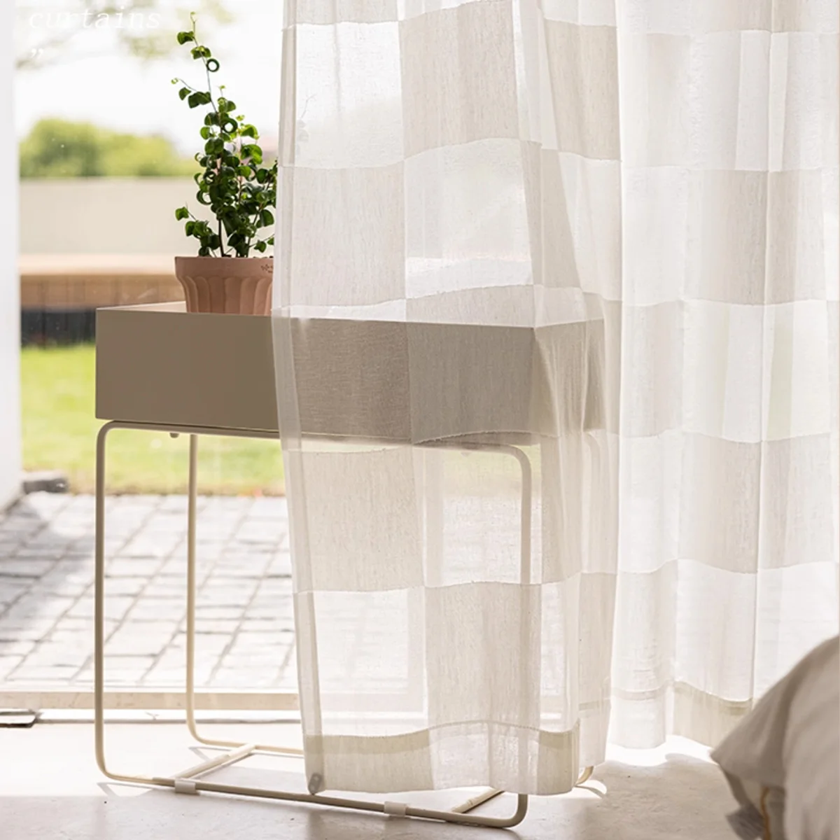 Block Stripe Sheer Curtain – soft beige check voile by a window with potted plant.