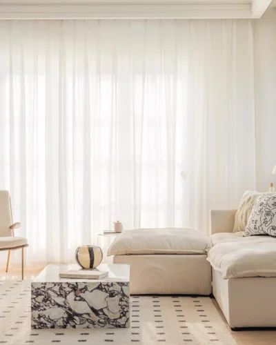 Cloudveil Sheer Curtain – white sheer curtains across a large window in a bright modern living room