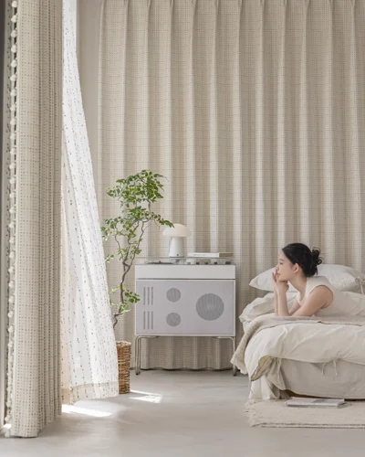 Sprinkle dot curtain by Lemonho in a soft textured weave with playful dotted pattern.