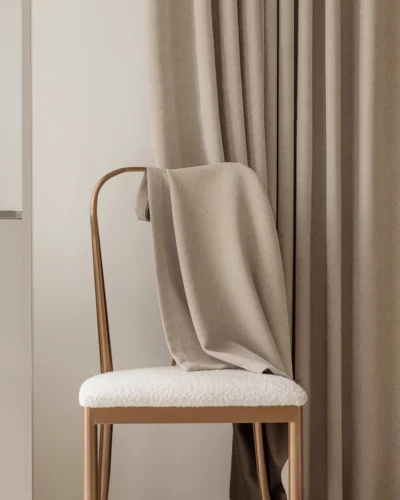 Milk Tea Cloud Curtain – milk tea beige soft-texture curtain draped on chair, light-filtering privacy fabric