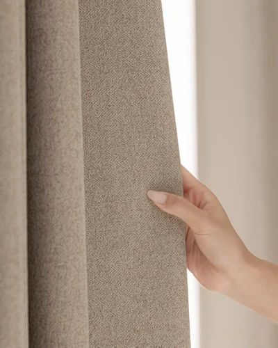 Hand touching Milk Tea Cloud Curtain fabric – soft textured beige curtain, light-filtering and privacy