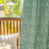 Green printed curtain with botanical maze pattern by the window – Verdant Maze by Lemonhone