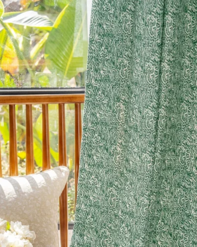 Green printed curtain with botanical maze pattern by the window – Verdant Maze by Lemonhone