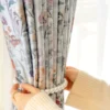 Botanical print curtain – floral detail with soft pastel pattern