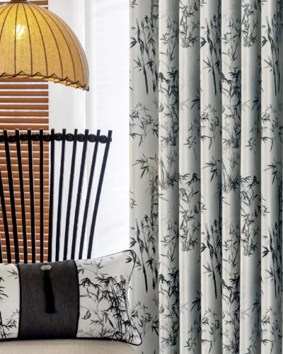 Ink bamboo curtain hanging with brushstroke bamboo pattern and soft pleats in a modern interior