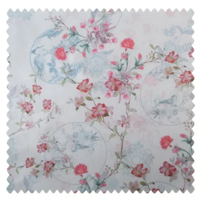 Fabric swatch of bird and floral curtain with vintage-style print in pastel tones