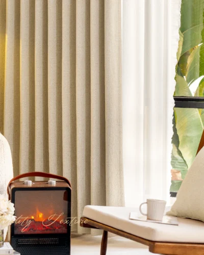 Sierra Weave Curtain in high-density fabric with soft glow, styled in a modern living room interior