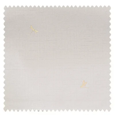Ivory-toned curtain fabric with fine dragonfly embroidery and a high-density texture.