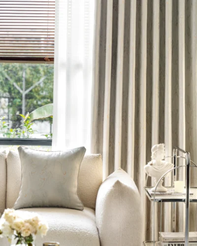 Ivory gold stone vein jacquard curtain hanging in a modern living room with soft daylight