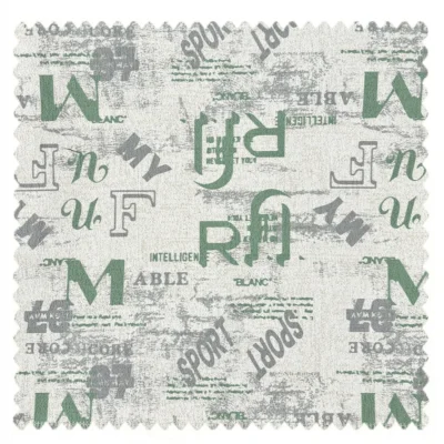 Green and grey letter print fabric swatch with scattered typography on a light background