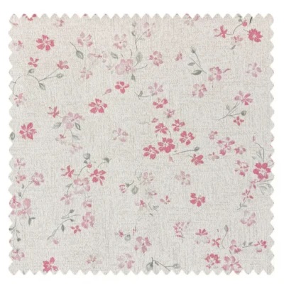 Pink floral print fabric swatch with delicate scattered blossoms on a light background