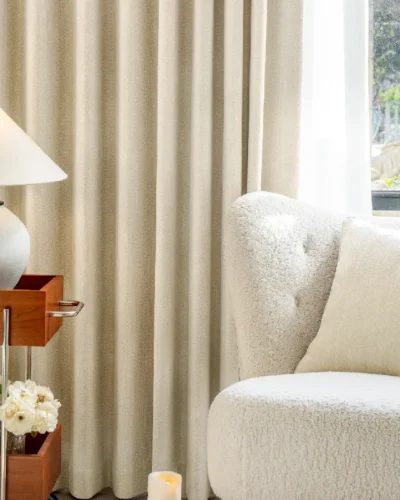 Herringbone curtain with pleats styled in a Japandi living room
