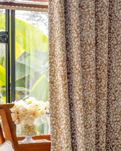 Floral Realm jacquard curtain in a bright window corner, styled with natural greenery and wood elements.