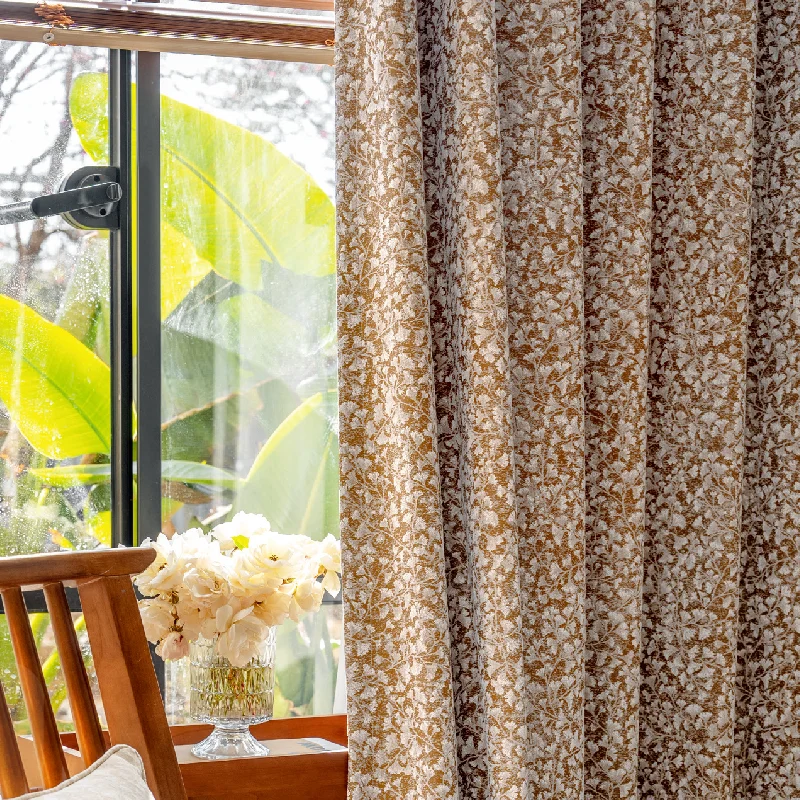 Floral Realm jacquard curtain in a bright window corner, styled with natural greenery and wood elements.