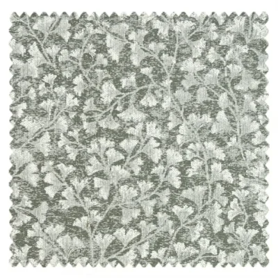 Green-grey curtain fabric swatch with floral weave and textured canvas finish.