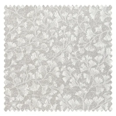 Light grey curtain fabric swatch with soft floral jacquard weave.