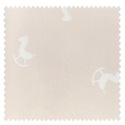 Rocking horse jacquard curtain fabric swatch in soft pastel pink, ideal for kids’ room drapes