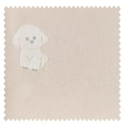 Fabric swatch for Friendly Pup Jacquard Curtain – pink base with embroidered dog pattern