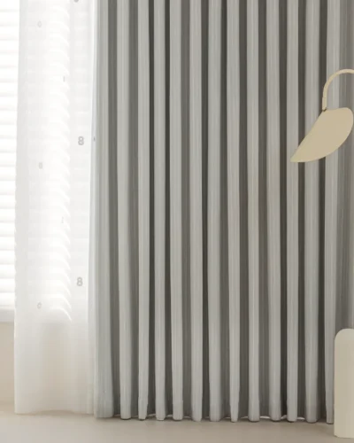 Blush Sweet Curtain in soft grey stripes with light-filtering jacquard texture, shown in a modern kids’ room