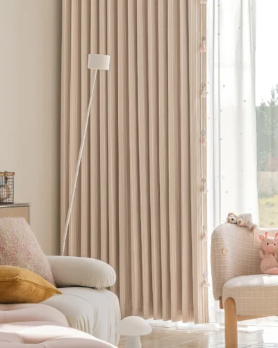 Blush Sweet Curtain – Striped Drapes Framing a Cozy Corner
