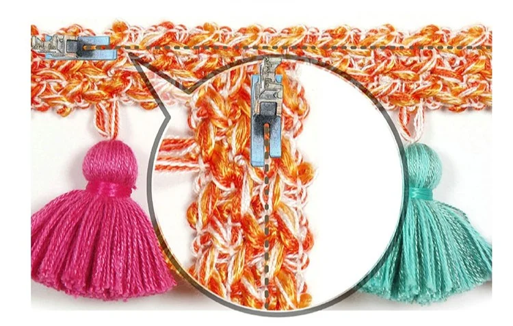 Close-up view of curtain tassel trim with orange braid and multicolor poms – style 013