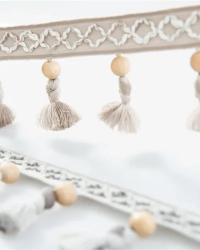 Close-up of Norwegian Forest Wood Bead Tassel Trim – Light and Natural Finish