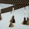 bamboo tassel curtain trim in green and neutral tones