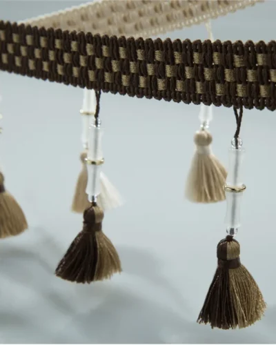 Curtain tassel trim with walnut brown and cream tones in bamboo-style weave