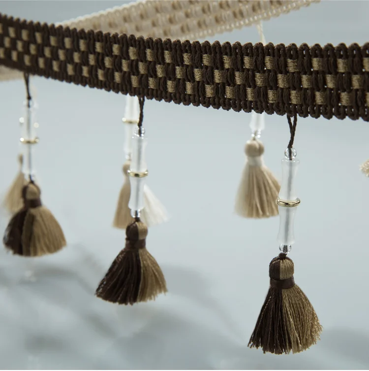 Curtain tassel trim with walnut brown and cream tones in bamboo-style weave