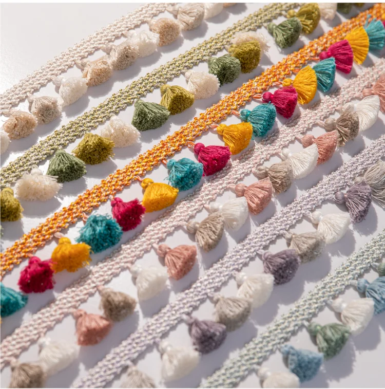 Multicolor curtain tassel trims displayed in rows – Eden Garden Fringe by Lemonhone