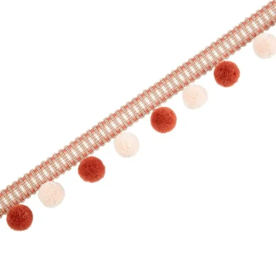 Rust and blush velvet pom pom fringe trim with soft gradient tones