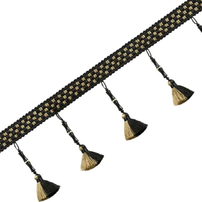 Black and gold curtain tassel trim with bamboo-inspired spacing and minimalist luxury style
