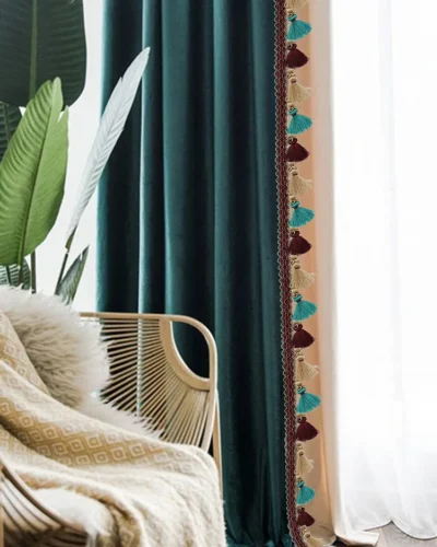 Medici Tassel Curtain Trim used on elegant velvet drapes in living room