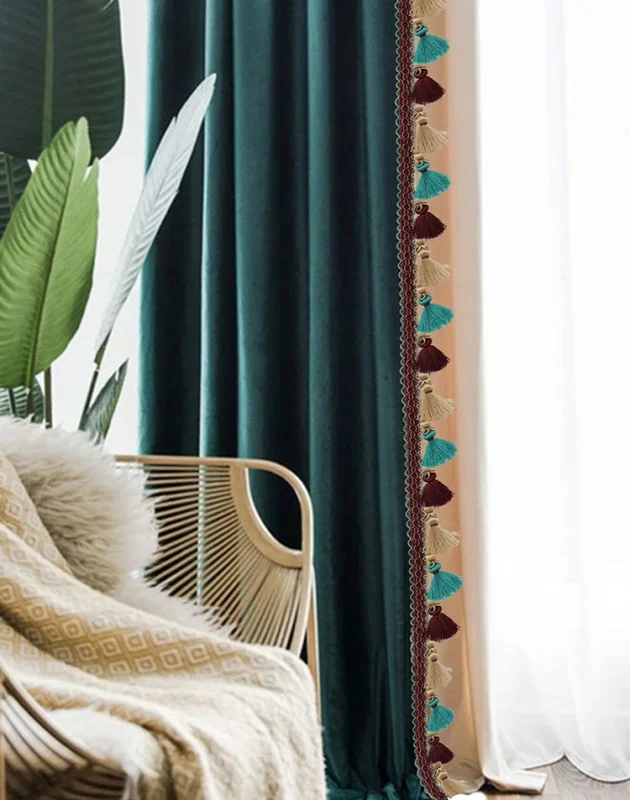 Medici Tassel Curtain Trim used on elegant velvet drapes in living room