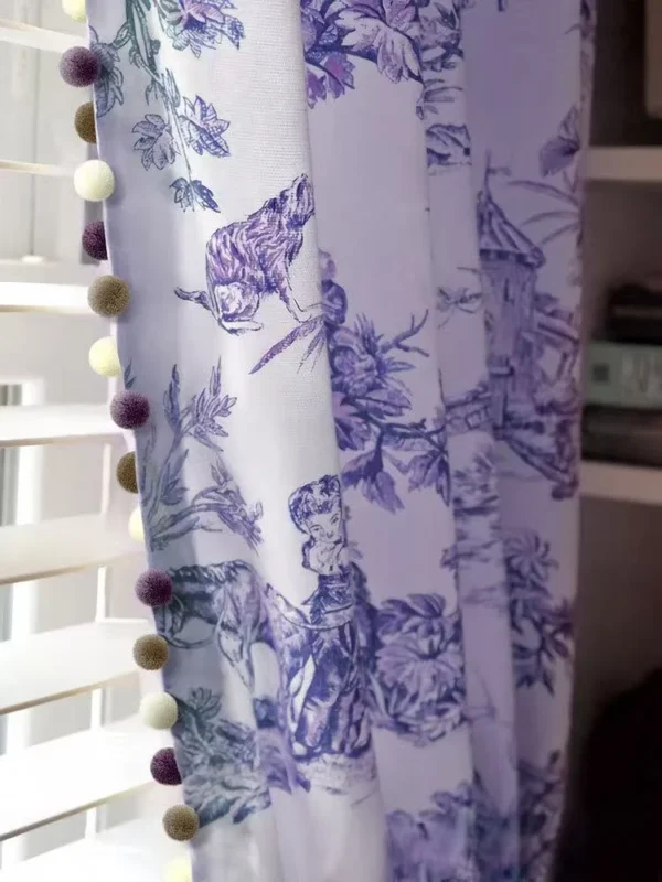 Floral curtain with green pom pom tassel trim – botanical window treatment in natural light