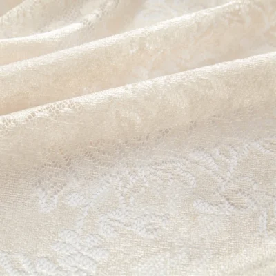 Sheer curtain fabric with openwork floral lace pattern and light-filtering jacquard weave