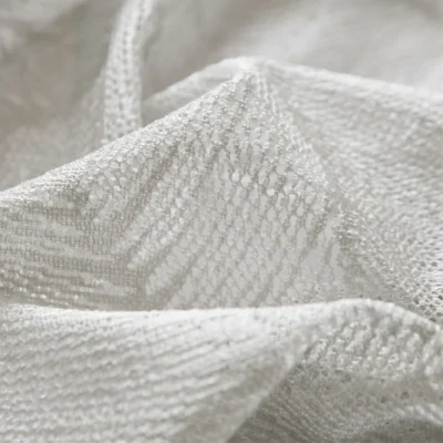 Close-up of Botanic Texture Sheer Curtain with soft light and natural leaf-like patterns