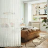 Blossom Veil Sheer Curtain in a modern living room with soft bloom texture