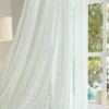 Blossom Veil Sheer Curtain hanging in front of window with soft daylight