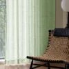 Jacquard Sheer Curtain with geometric leaf texture hanging beside a neutral wall and diffuser set